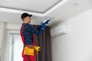 Drywall worker doing the Maintenance